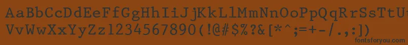 フォントPrestigeNormal – 黒い文字が茶色の背景にあります