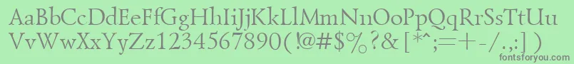 フォントGoudiold – 緑の背景に灰色の文字