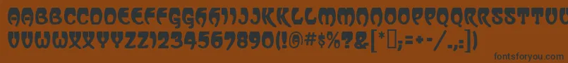 VassarMf-fontti – mustat fontit ruskealla taustalla