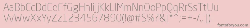 NeoSansProLight-fontti – harmaat kirjasimet vaaleanpunaisella taustalla