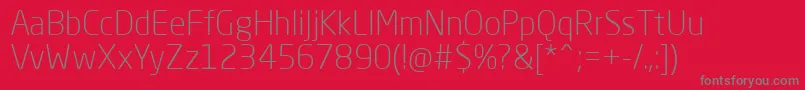 NeoSansProLight-fontti – harmaat kirjasimet punaisella taustalla