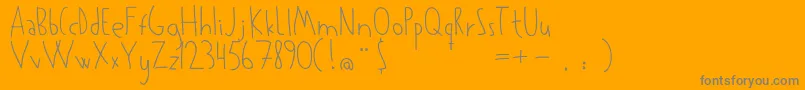 Kowalski-Schriftart – Graue Schriften auf orangefarbenem Hintergrund