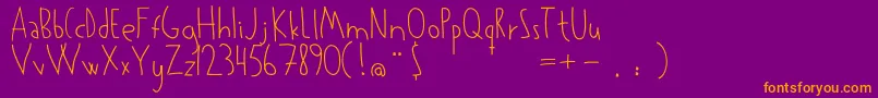 Kowalski Font – Orange Fonts on Purple Background