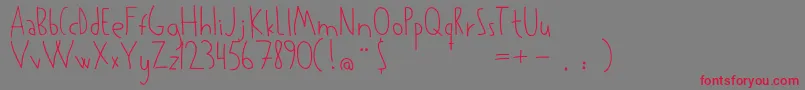 Kowalski Font – Red Fonts on Gray Background
