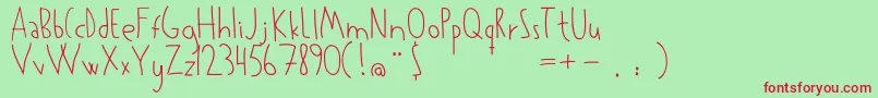 Kowalski Font – Red Fonts on Green Background
