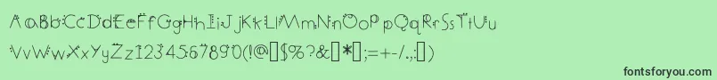 DecemberDeco Font – Black Fonts on Green Background