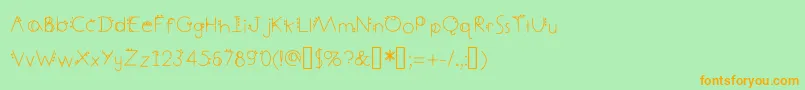 DecemberDeco Font – Orange Fonts on Green Background