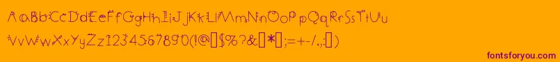 DecemberDeco Font – Purple Fonts on Orange Background