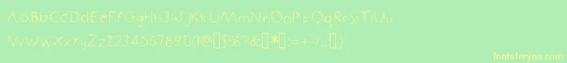 フォントDecemberDeco – 黄色の文字が緑の背景にあります