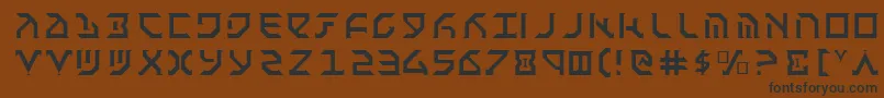 フォントFantl – 黒い文字が茶色の背景にあります