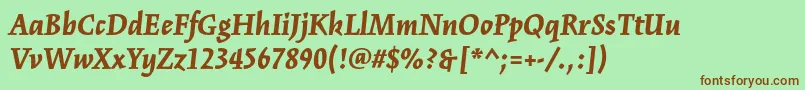 KinesisstdBlackitalic-Schriftart – Braune Schriften auf grünem Hintergrund