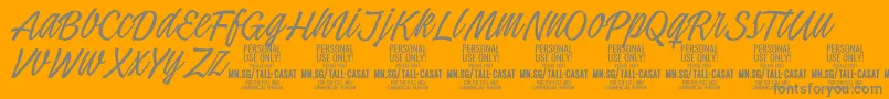 TallcasatthinPersonalUse-Schriftart – Graue Schriften auf orangefarbenem Hintergrund