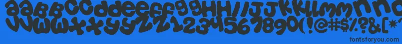 Tosscasu Font – Black Fonts on Blue Background