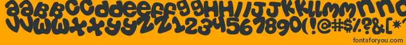 Tosscasu Font – Black Fonts on Orange Background