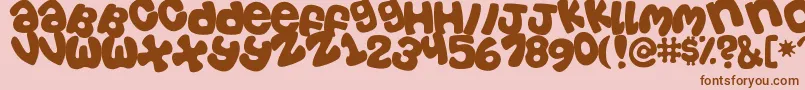 Tosscasu Font – Brown Fonts on Pink Background