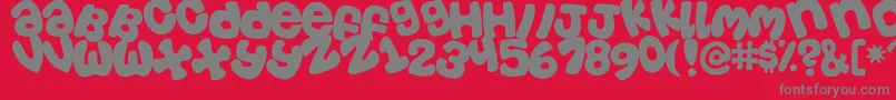 フォントTosscasu – 赤い背景に灰色の文字