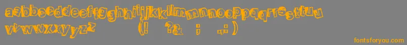 フォントSmellveticaOutline – オレンジの文字は灰色の背景にあります。