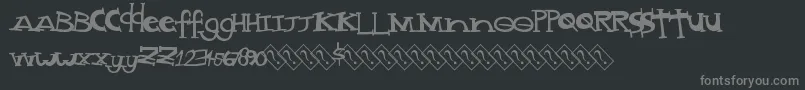 フォントMadstyle – 黒い背景に灰色の文字