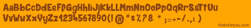 SpiderMonkey-Schriftart – Braune Schriften auf orangefarbenem Hintergrund