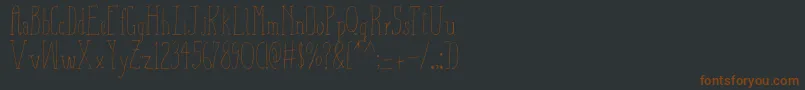 Fonte AizaShineSerif – fontes marrons em um fundo preto