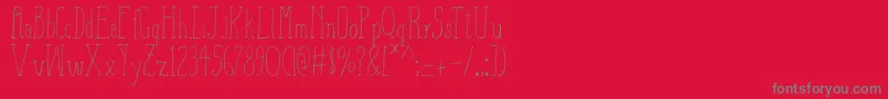 Fonte AizaShineSerif – fontes cinzas em um fundo vermelho