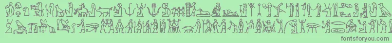 Czcionka Hieroglify – szare czcionki na zielonym tle