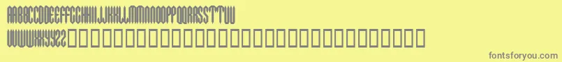 Metalcrusher-fontti – harmaat kirjasimet keltaisella taustalla