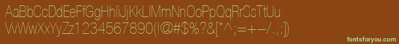 Fonte HelveticaLt27UltraLightCondensed – fontes verdes em um fundo marrom