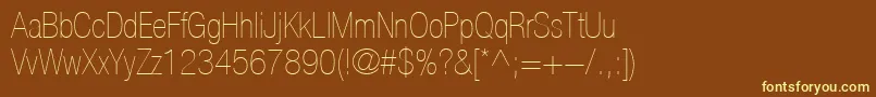 Шрифт HelveticaLt27UltraLightCondensed – жёлтые шрифты на коричневом фоне