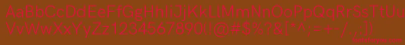 HkgroteskRegular Font – Red Fonts on Brown Background