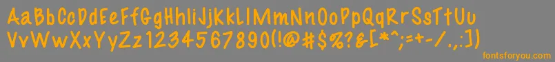 フォントFil3 – オレンジの文字は灰色の背景にあります。