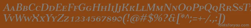 Czcionka TusartextscItalic – szare czcionki na brązowym tle