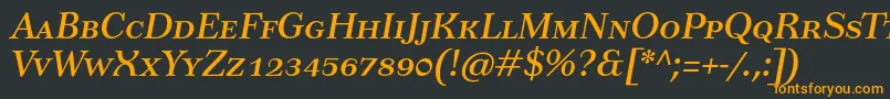 Czcionka TusartextscItalic – pomarańczowe czcionki na czarnym tle