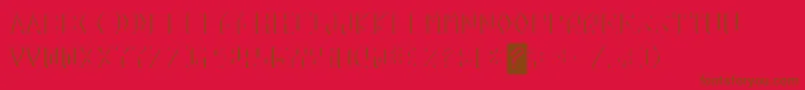 フォントKreditShine – 赤い背景に茶色の文字