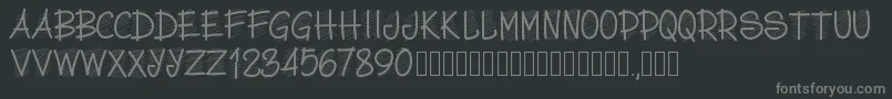 Pwscritch-fontti – harmaat kirjasimet mustalla taustalla