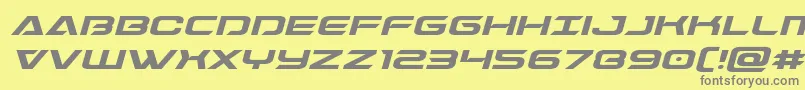 Dameronexpandital-fontti – harmaat kirjasimet keltaisella taustalla