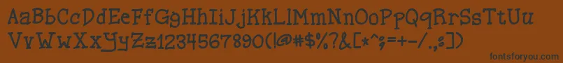 FortuneLetters Font – Black Fonts on Brown Background