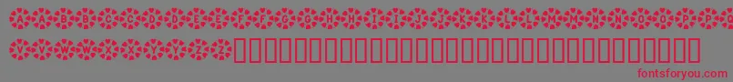 Шрифт KrWreathOfHearts – красные шрифты на сером фоне