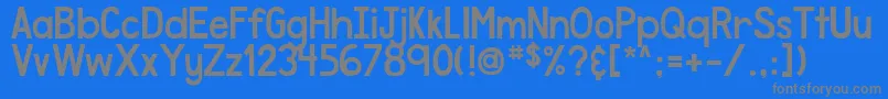 DjbSpeakTheTruth-Schriftart – Graue Schriften auf blauem Hintergrund