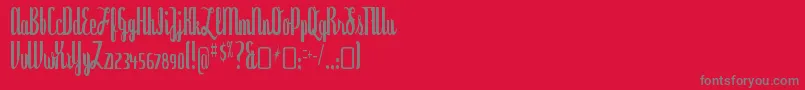 フォントDyspepsiaRegular – 赤い背景に灰色の文字