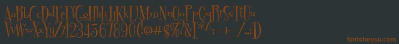 Шрифт Pudelina – коричневые шрифты на чёрном фоне