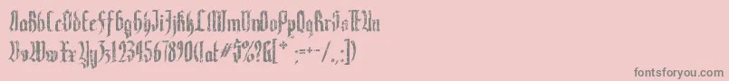 フォントVaraninde – ピンクの背景に灰色の文字