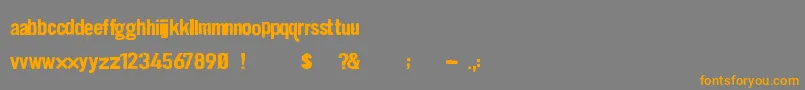 フォントDirt2 Stickler – オレンジの文字は灰色の背景にあります。