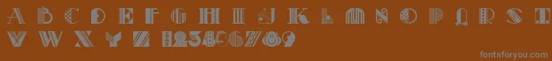 Шрифт Pastiche – серые шрифты на коричневом фоне