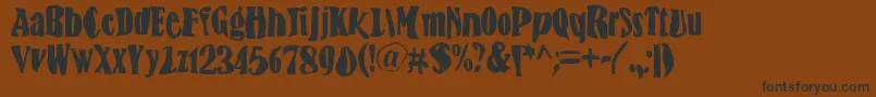 フォントBnFisheye – 黒い文字が茶色の背景にあります