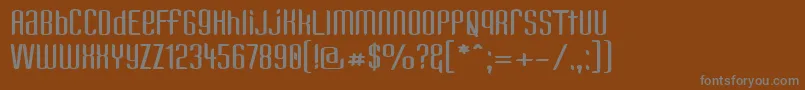 KandideUnicaseWide Font – Gray Fonts on Brown Background