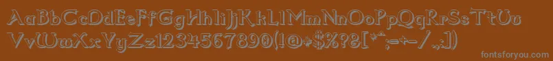 Dum2shad-fontti – harmaat kirjasimet ruskealla taustalla