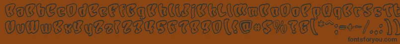 フォントCharo – 黒い文字が茶色の背景にあります