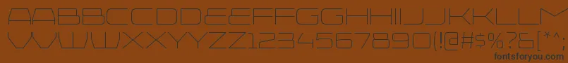 InjekutaltRegular Font – Black Fonts on Brown Background