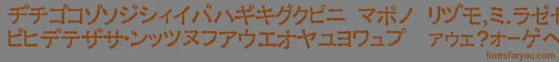 フォントExKata1 – 茶色の文字が灰色の背景にあります。